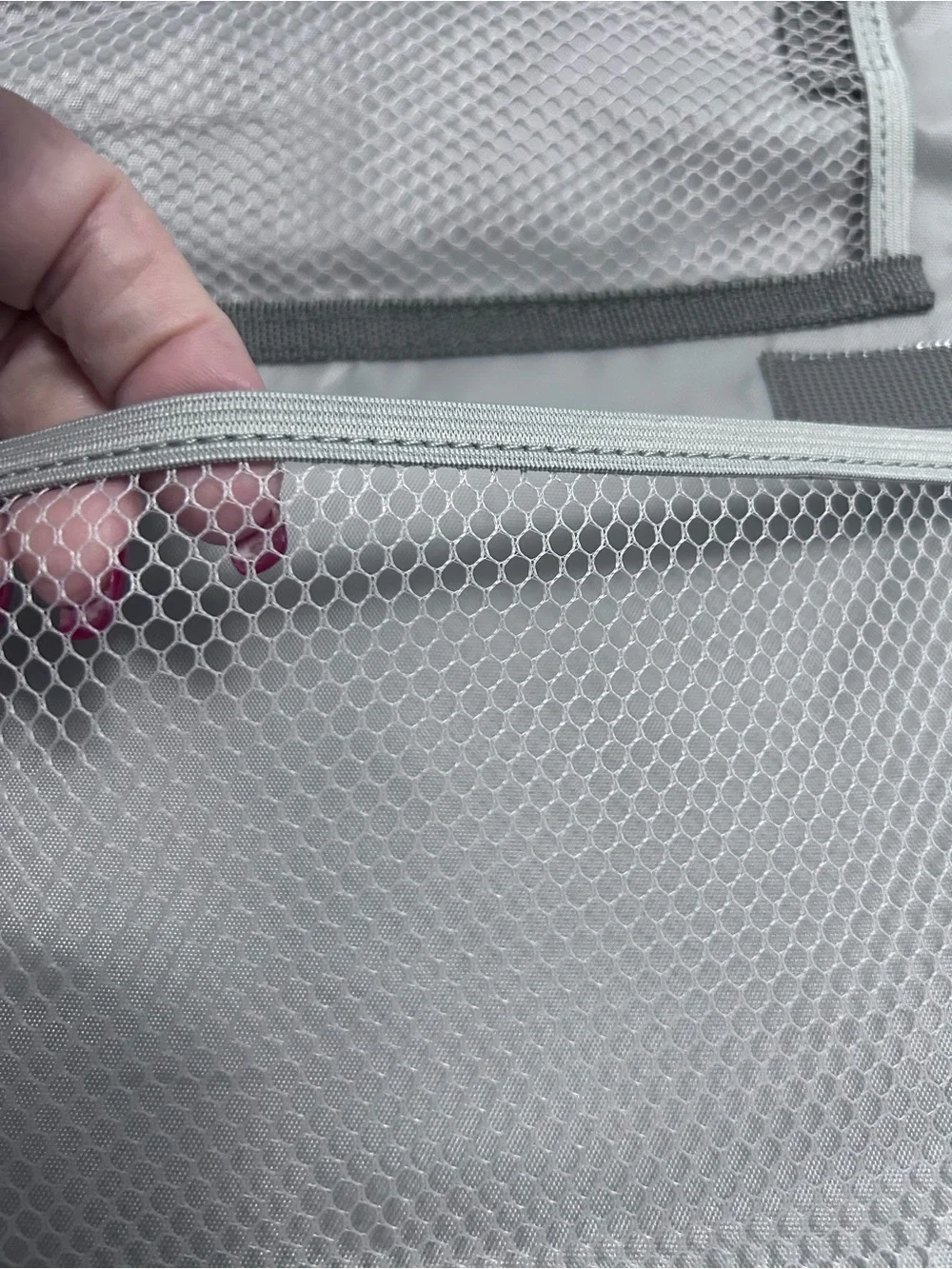 Grey Foldable Portable Changing Pad for Baby with Secure Buckle.